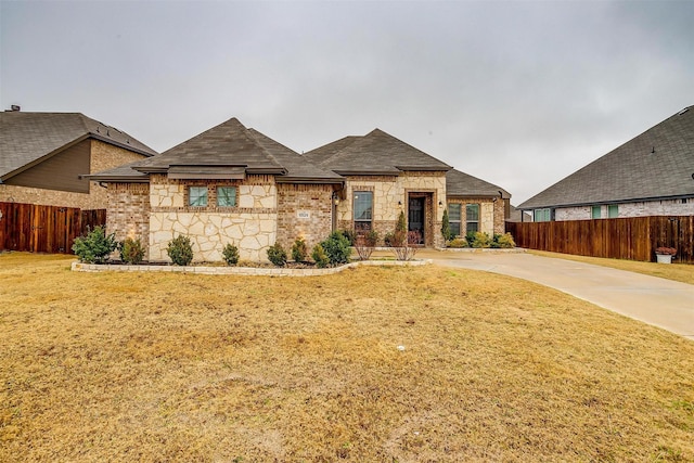 view of front of home with a front yard