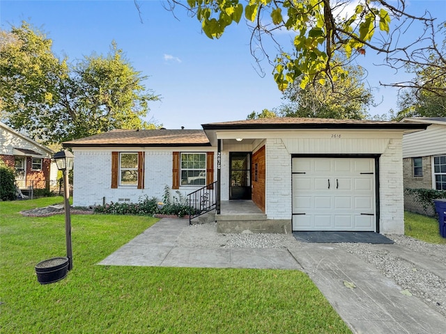 ranch-style house featuring a garage and a front lawn