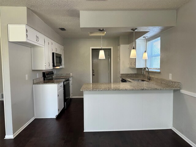 kitchen with baseboards, white cabinets, appliances with stainless steel finishes, tile patterned floors, and a textured ceiling