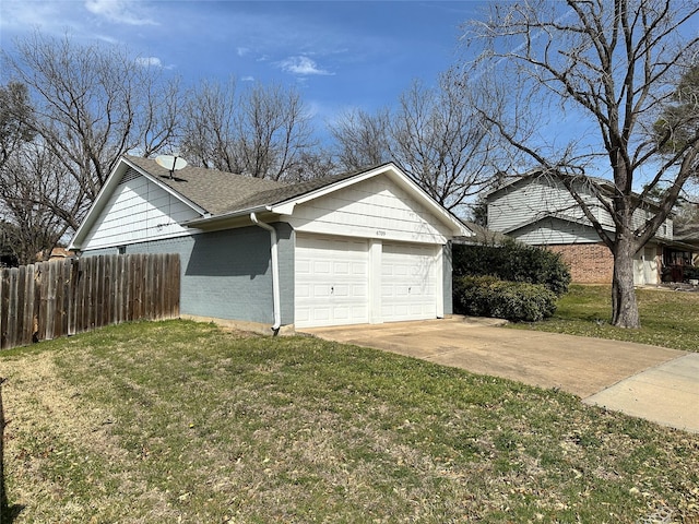 garage featuring fence