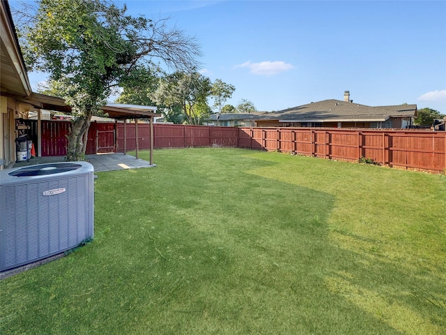 view of yard featuring central AC unit