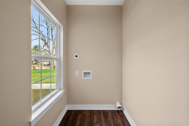 laundry area with dark wood-type flooring, hookup for an electric dryer, and hookup for a washing machine