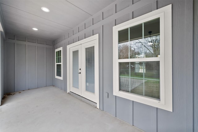 view of exterior entry featuring french doors