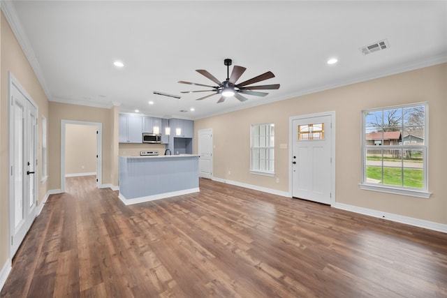 interior space with crown molding, dark hardwood / wood-style floors, and ceiling fan