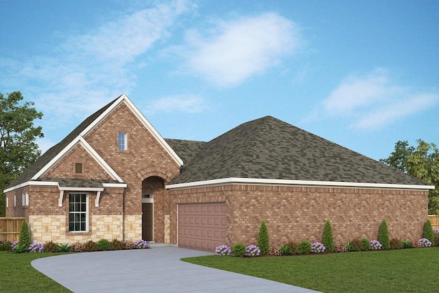 view of front of home with a garage and a front yard