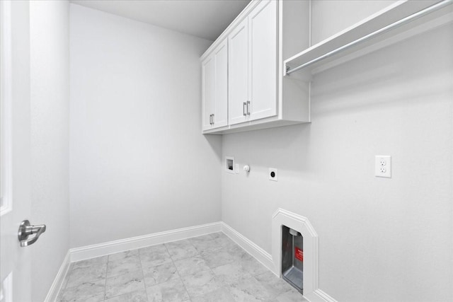 laundry room with electric dryer hookup, washer hookup, hookup for a gas dryer, and cabinets