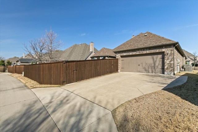 view of home's exterior featuring a garage