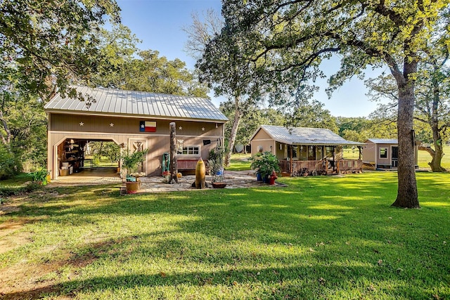 back of house featuring a yard