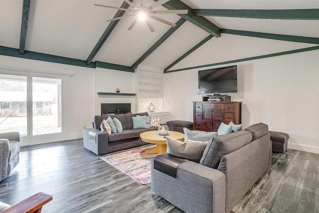 living room featuring ceiling fan, hardwood / wood-style floors, and vaulted ceiling with beams