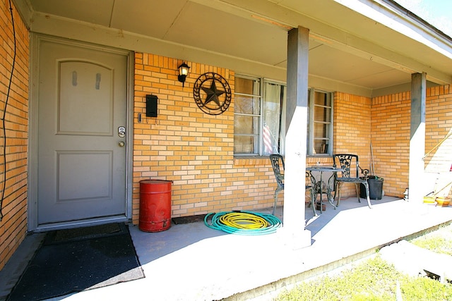 entrance to property with covered porch