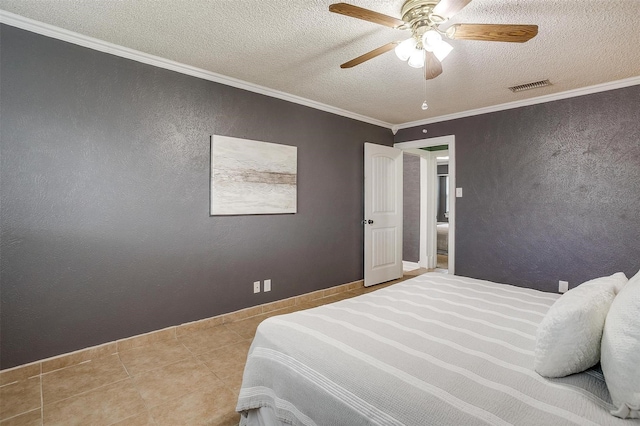 tiled bedroom with ceiling fan, ornamental molding, and a textured ceiling