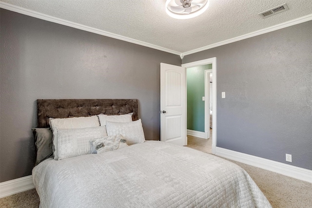 bedroom with light carpet, crown molding, and a textured ceiling