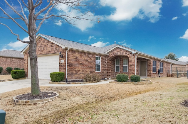 single story home featuring a garage