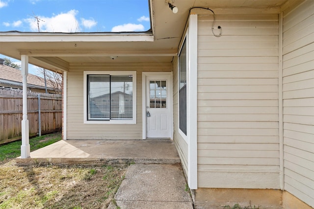 property entrance with a patio