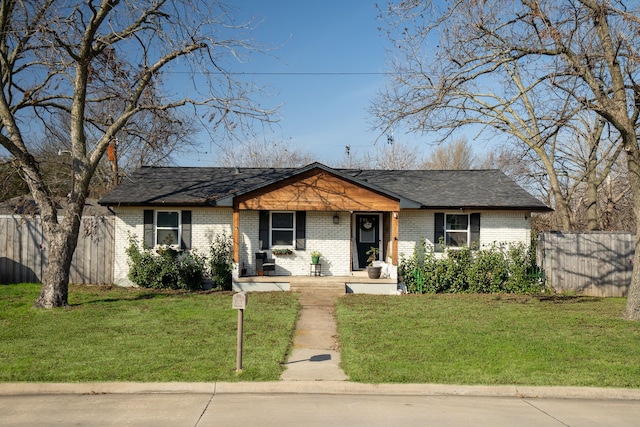 ranch-style house with a front yard