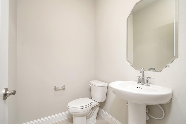 bathroom featuring toilet