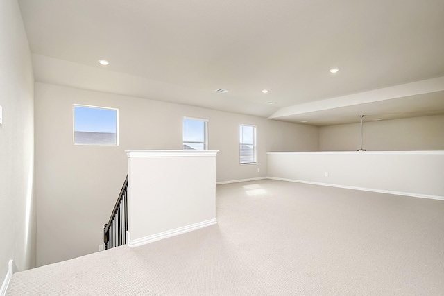 basement with light colored carpet