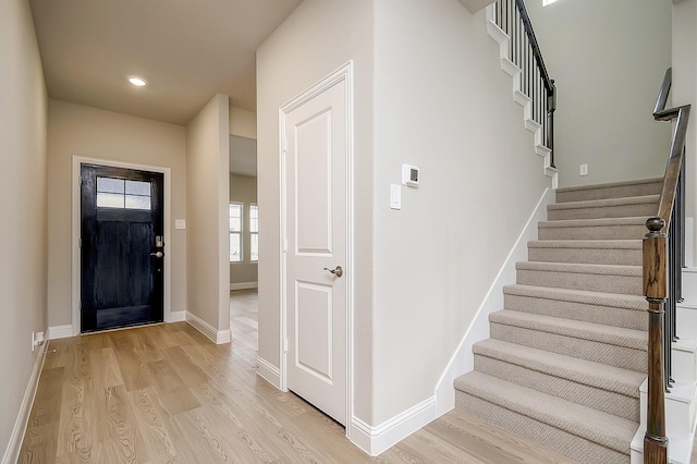 entrance foyer with light wood-type flooring