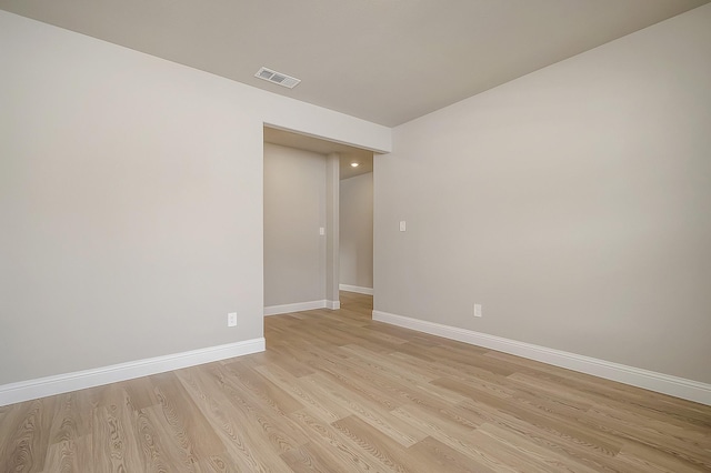 unfurnished room featuring light wood-type flooring