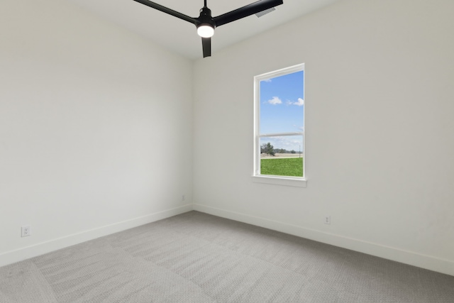 empty room with carpet floors and ceiling fan