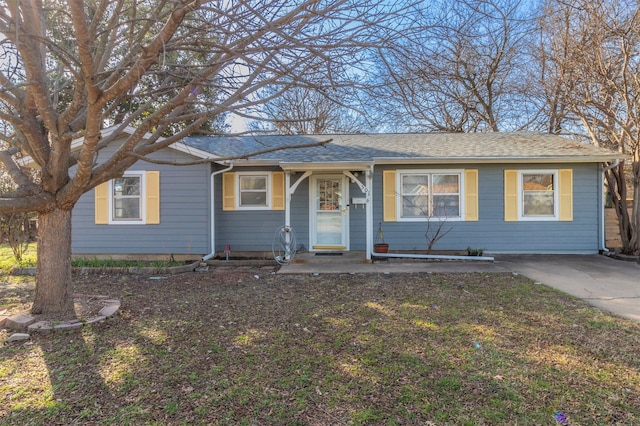 ranch-style house with a front yard