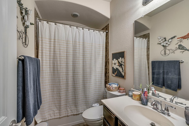 full bathroom with toilet, shower / bathtub combination with curtain, and vanity