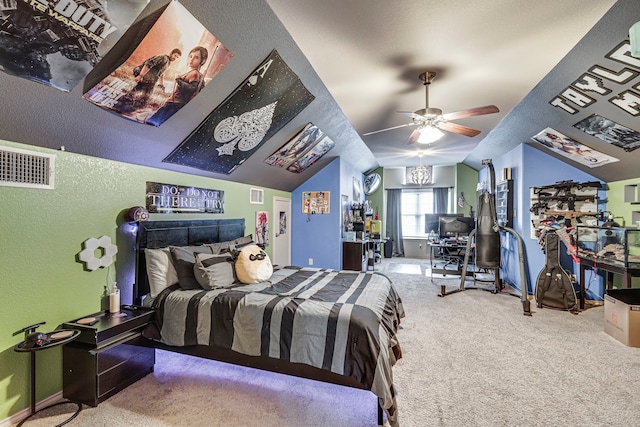 bedroom with carpet floors, vaulted ceiling, and ceiling fan