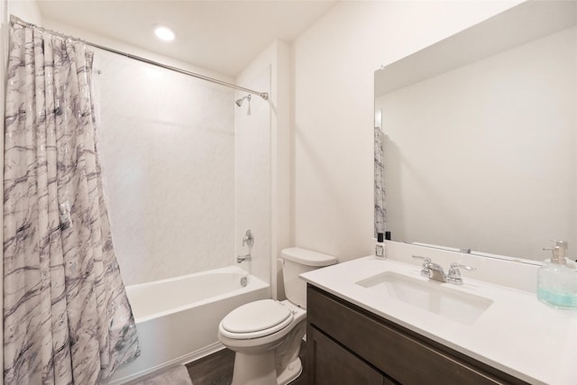 full bathroom with shower / bath combination with curtain, vanity, and toilet