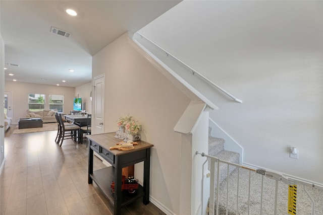 hallway featuring hardwood / wood-style floors