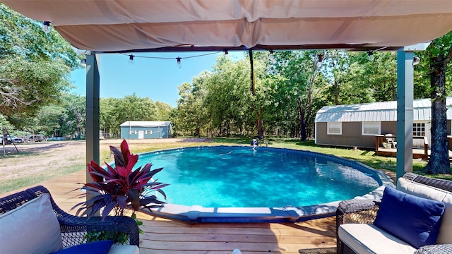 1004 Rs County Road 3345, Emory, TX 75440 - view of pool with a shed and a wooden deck