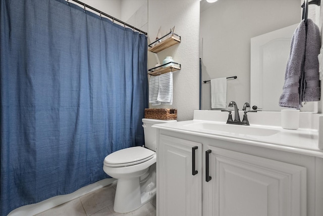 5626 Rowlan Row, Midlothian, TX 76065 - full bathroom with toilet, vanity, tile patterned floors, a textured wall, and a shower with shower curtain