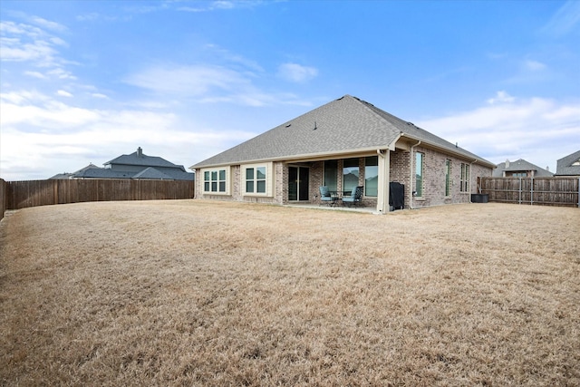 rear view of house with a patio area