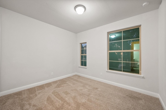 view of carpeted spare room