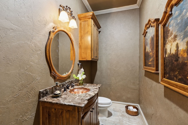 half bathroom featuring crown molding, a textured wall, toilet, vanity, and baseboards