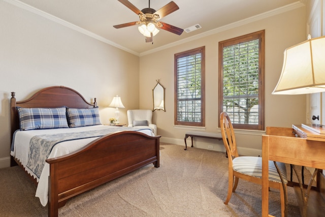 carpeted bedroom with ceiling fan, ornamental molding, visible vents, and baseboards