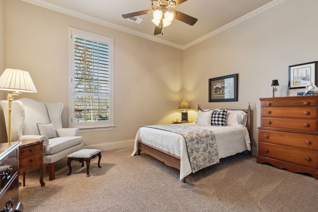 carpeted bedroom featuring baseboards, a ceiling fan, and crown molding