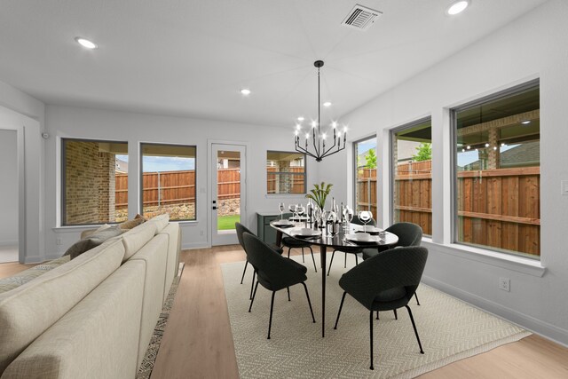 602 Lundy Ln, Mansfield, TX 76063 - dining room with light wood-style flooring, a chandelier, recessed lighting, and baseboards