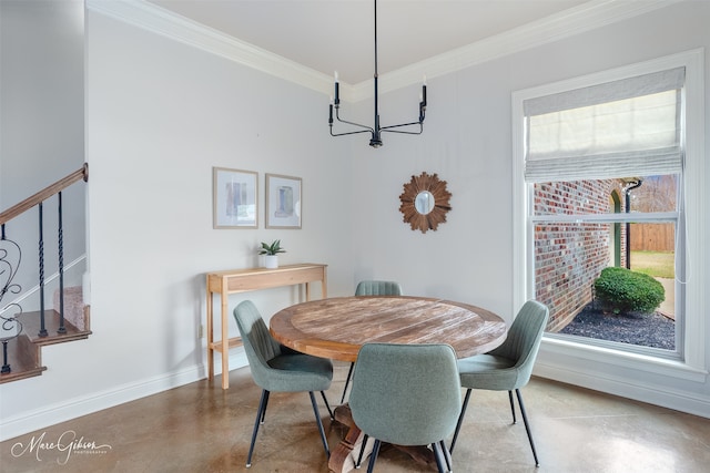 dining area with ornamental molding and concrete flooring