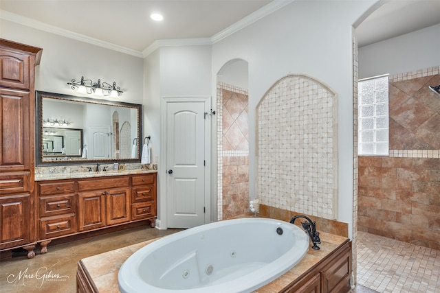 bathroom with crown molding, vanity, and plus walk in shower