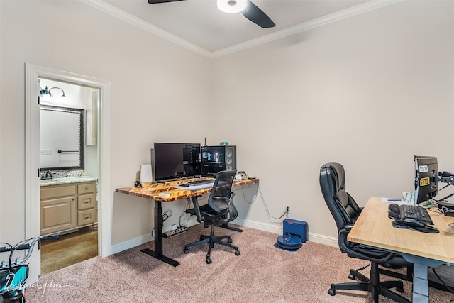 carpeted office with crown molding, ceiling fan, and sink