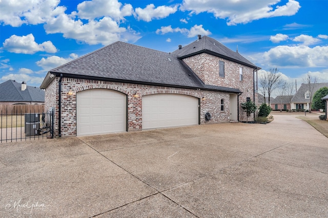 view of property exterior featuring a garage