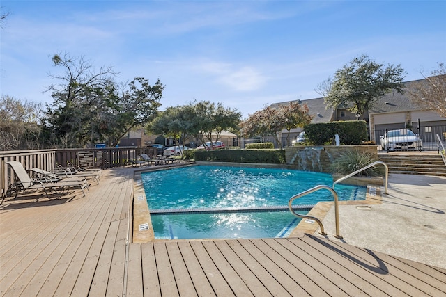 view of pool featuring a patio area and pool water feature