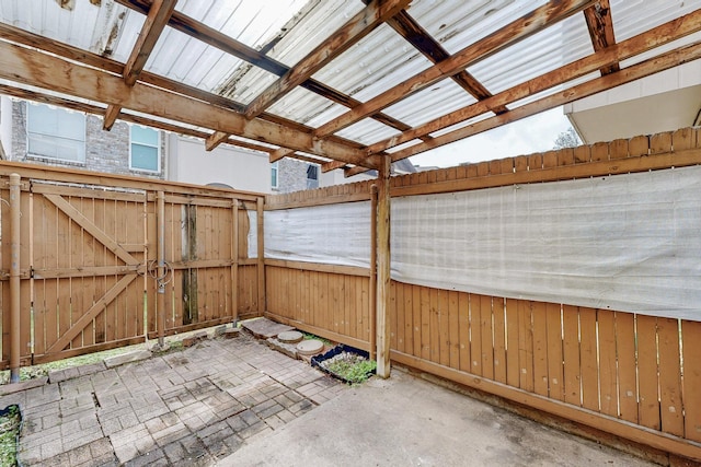 view of patio / terrace with a fenced backyard and a gate