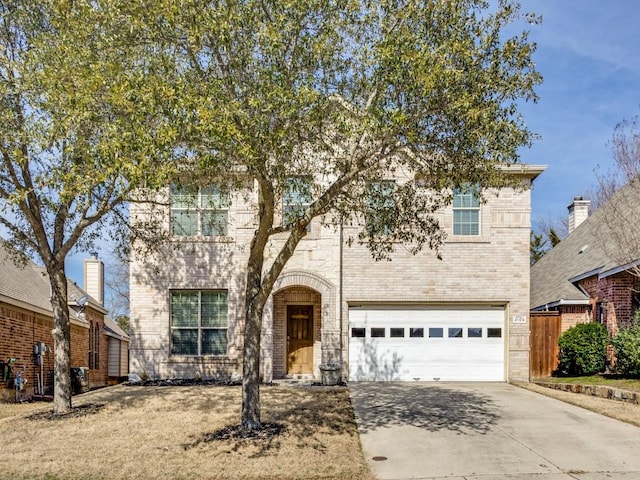 front of property with a garage