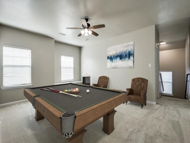 recreation room with ceiling fan, pool table, and light carpet