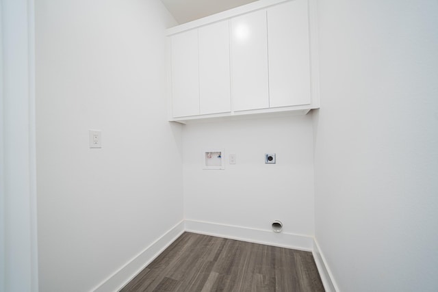 laundry area with cabinets, hookup for a washing machine, dark hardwood / wood-style floors, and hookup for an electric dryer