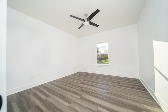 unfurnished room with wood-type flooring and ceiling fan