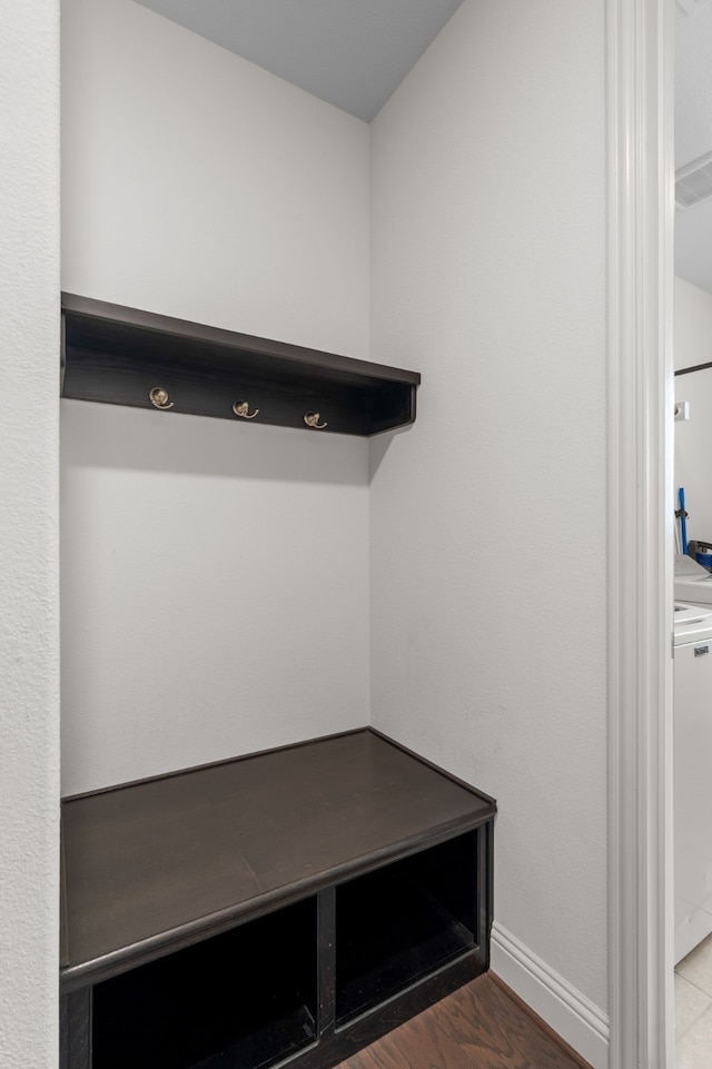 mudroom with hardwood / wood-style floors