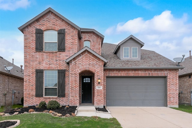 2466 San Marcos Dr, Forney, TX 75126 - view of front of house featuring a garage and a front lawn