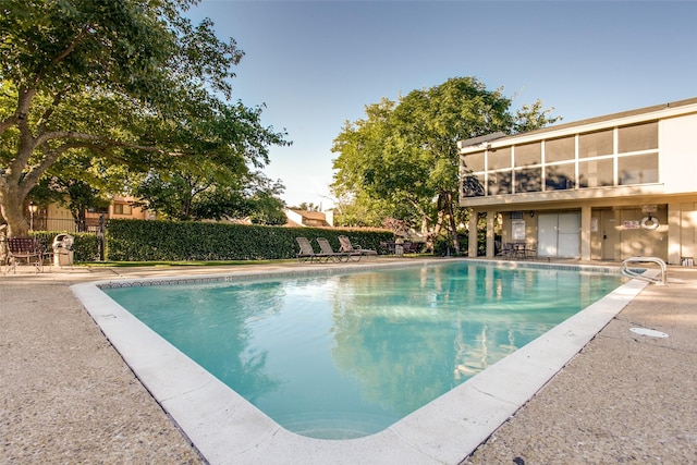 view of pool featuring a patio area